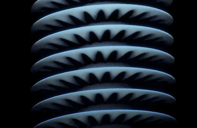 Abstract close-up of layered turbine blades, symbolizing efficiency and innovation in ERP systems and consulting practices.